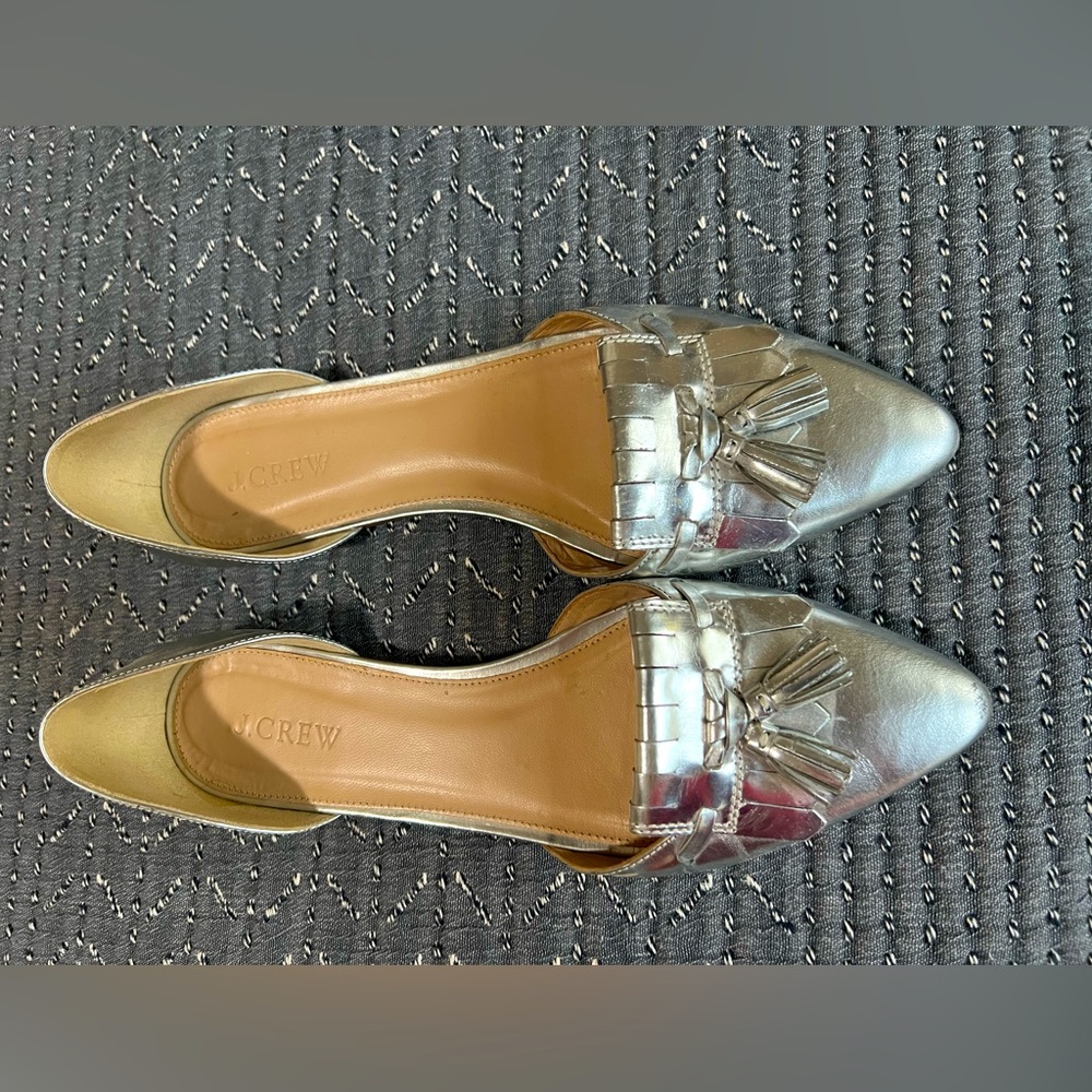 J. Crew pointy toe flat in metallic silver with tassels. Size 8